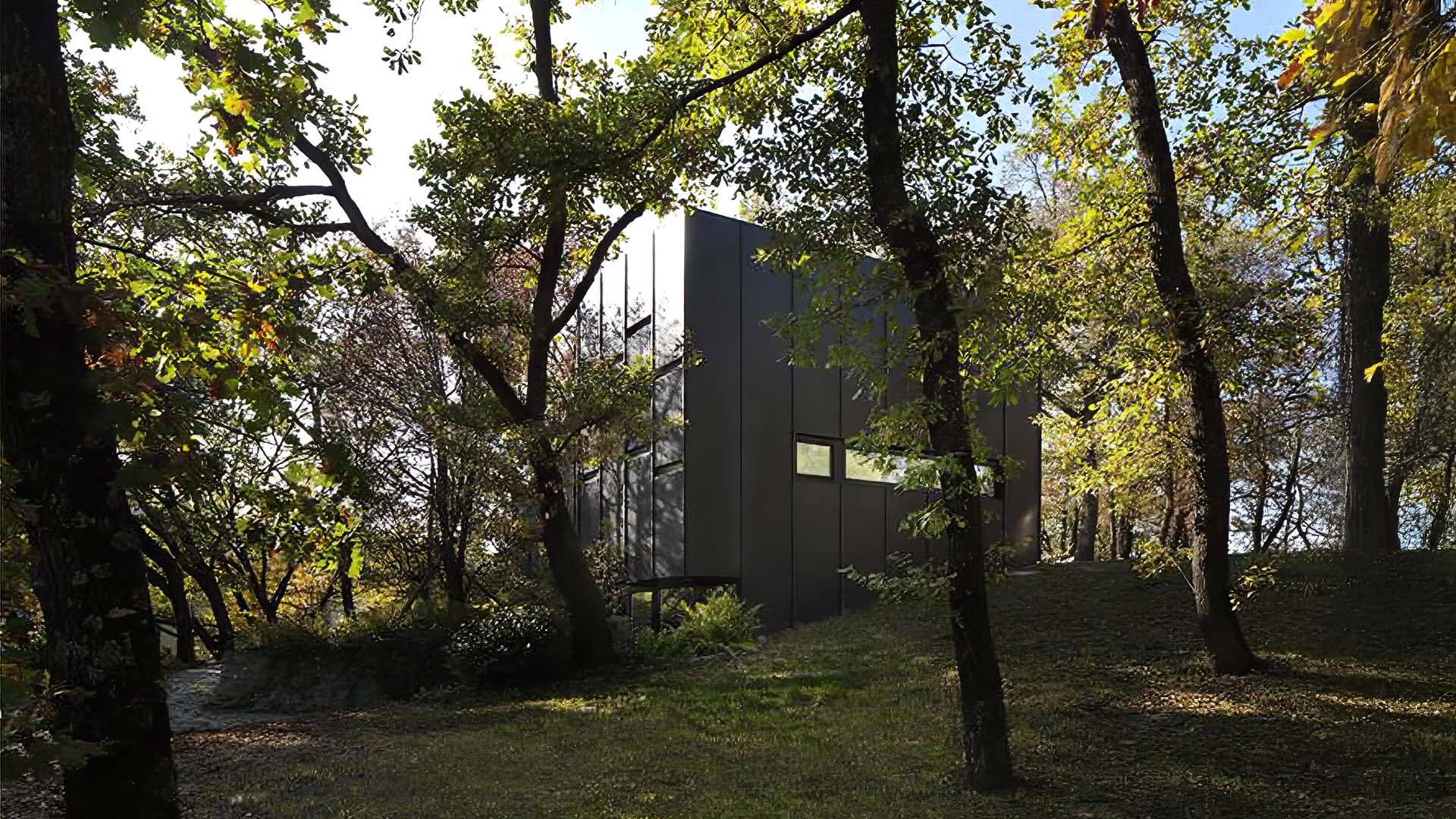 Guest house visione esterna in mezzo agli alberi.